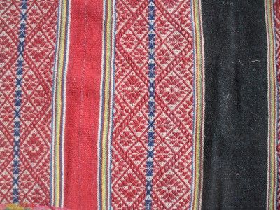 colorful and intricately woven antique Alpaca blanket or altar cloth 