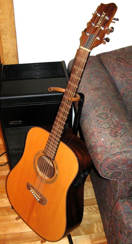   LH, all solid woods with HSC lefty left hand and martin strings  