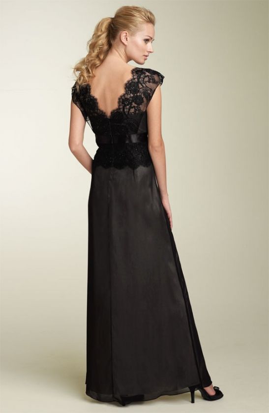   at the Empire waist lends feminine detail above the soft A line skirt