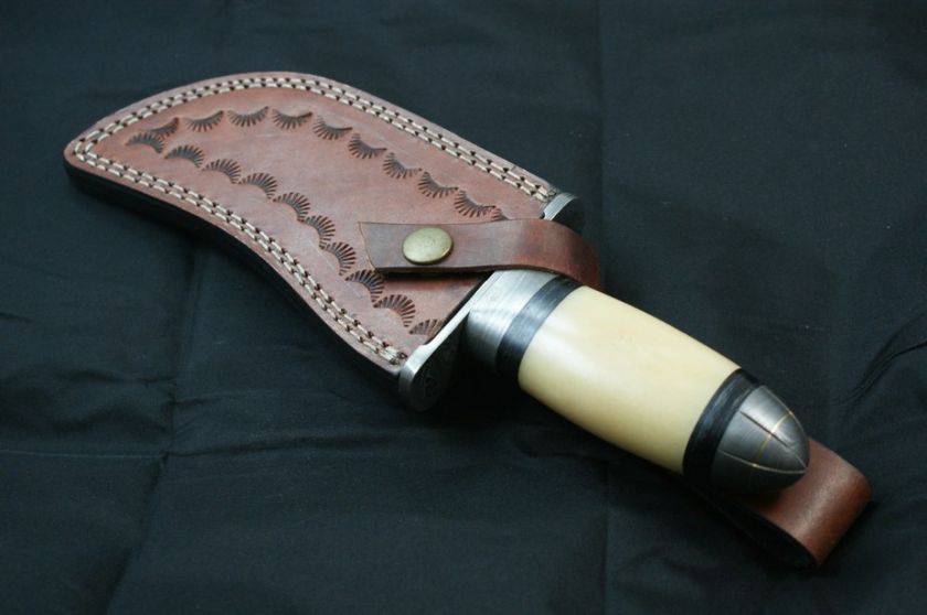   hunting knife. Damascus guard & pomel. Razor sharp. Solid sheath