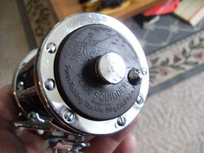 PENN SQUIDDER 140 REEL WORKS GREAT HAS SOME PITTING LOOK AT ALL THE 