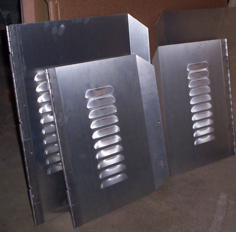 Louvered Aluminum dog doors  15 x 21 left hand hinged  